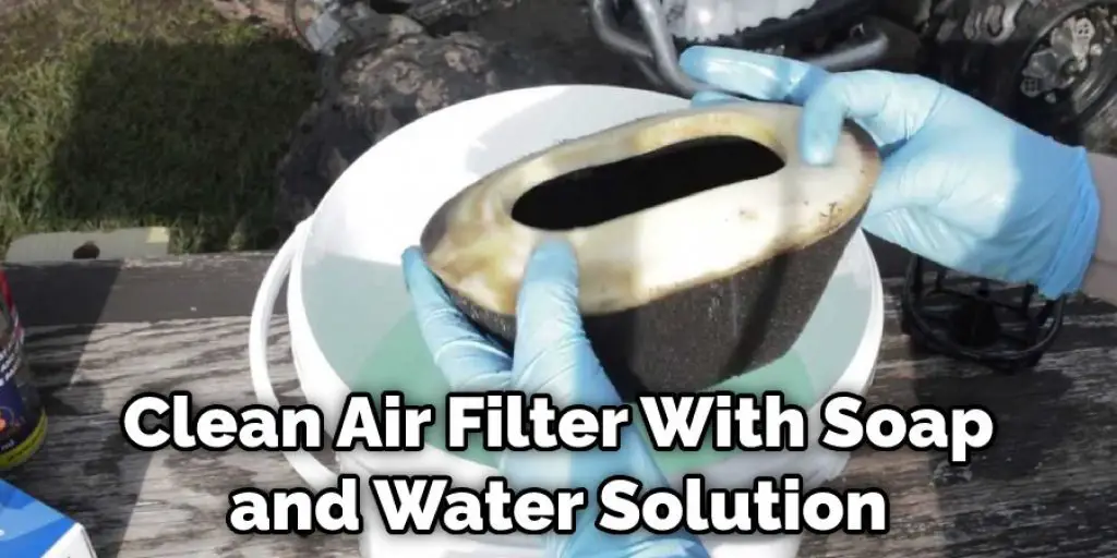 Clean Air Filter With Soap and Water Solution