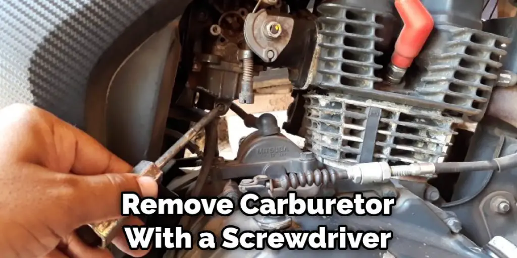 Remove Carburetor With a Screwdriver