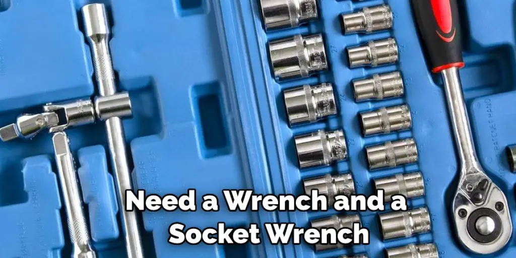 Need a Wrench and a  Socket Wrench